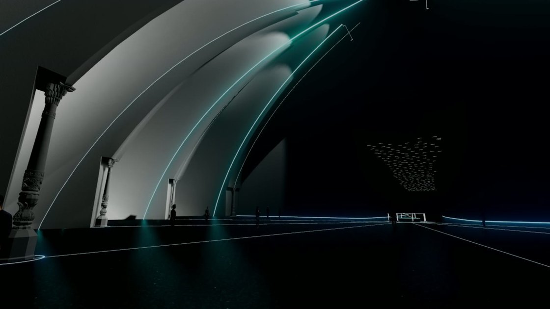 Inside the museum: historic columns under a sweeping vault traced in light