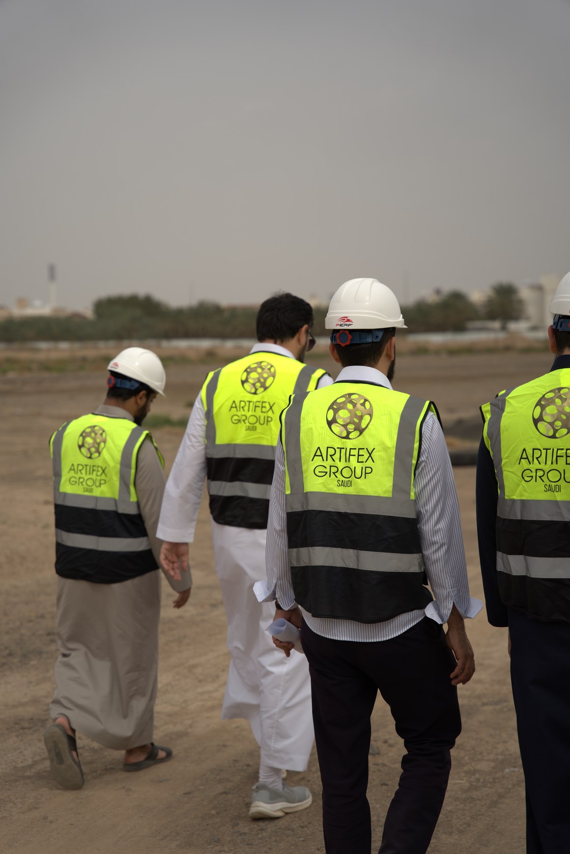 The site team walking the plot in ARTIFEX hi-vis